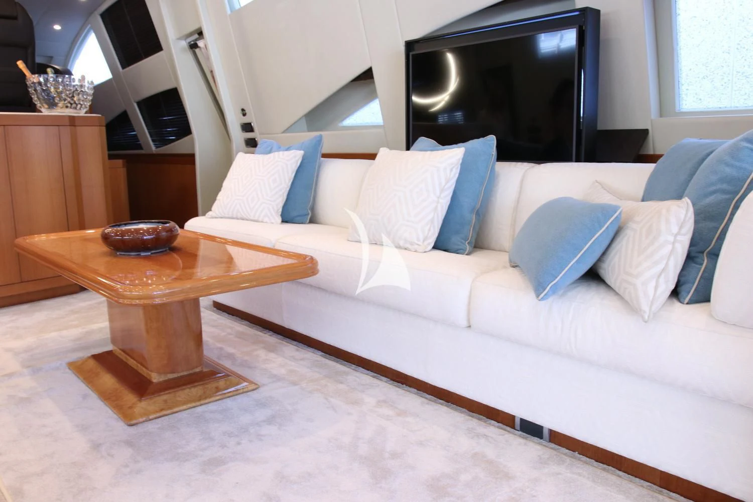 a white couch with blue pillows aboard RAMSES II Yacht for Sale