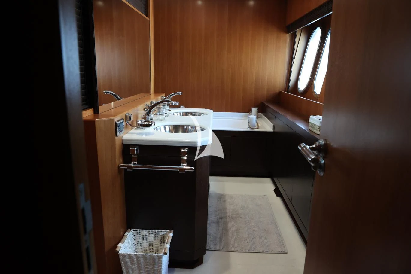 a bathroom with a sink and a mirror aboard RAMSES II Yacht for Sale