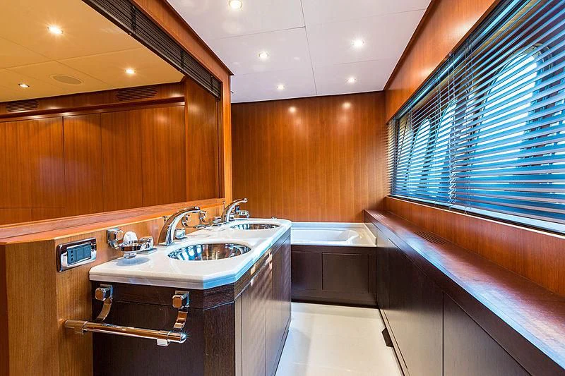 a bathroom with a sink and a bathtub aboard RAMSES II Yacht for Sale