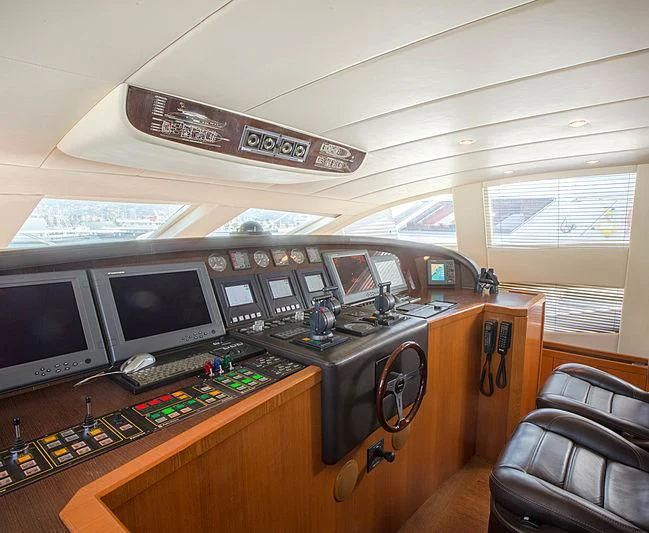 a room with computers and monitors aboard RAMSES II Yacht for Sale
