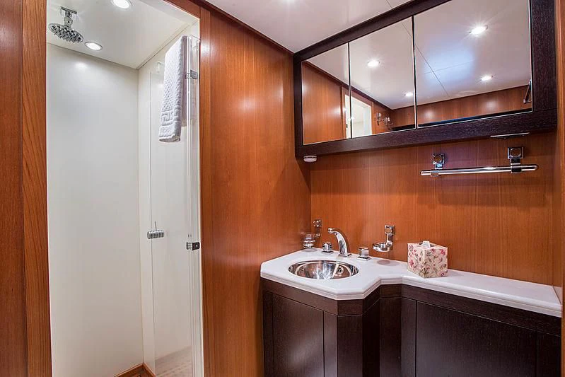 a bathroom with a sink and cabinets aboard RAMSES II Yacht for Sale