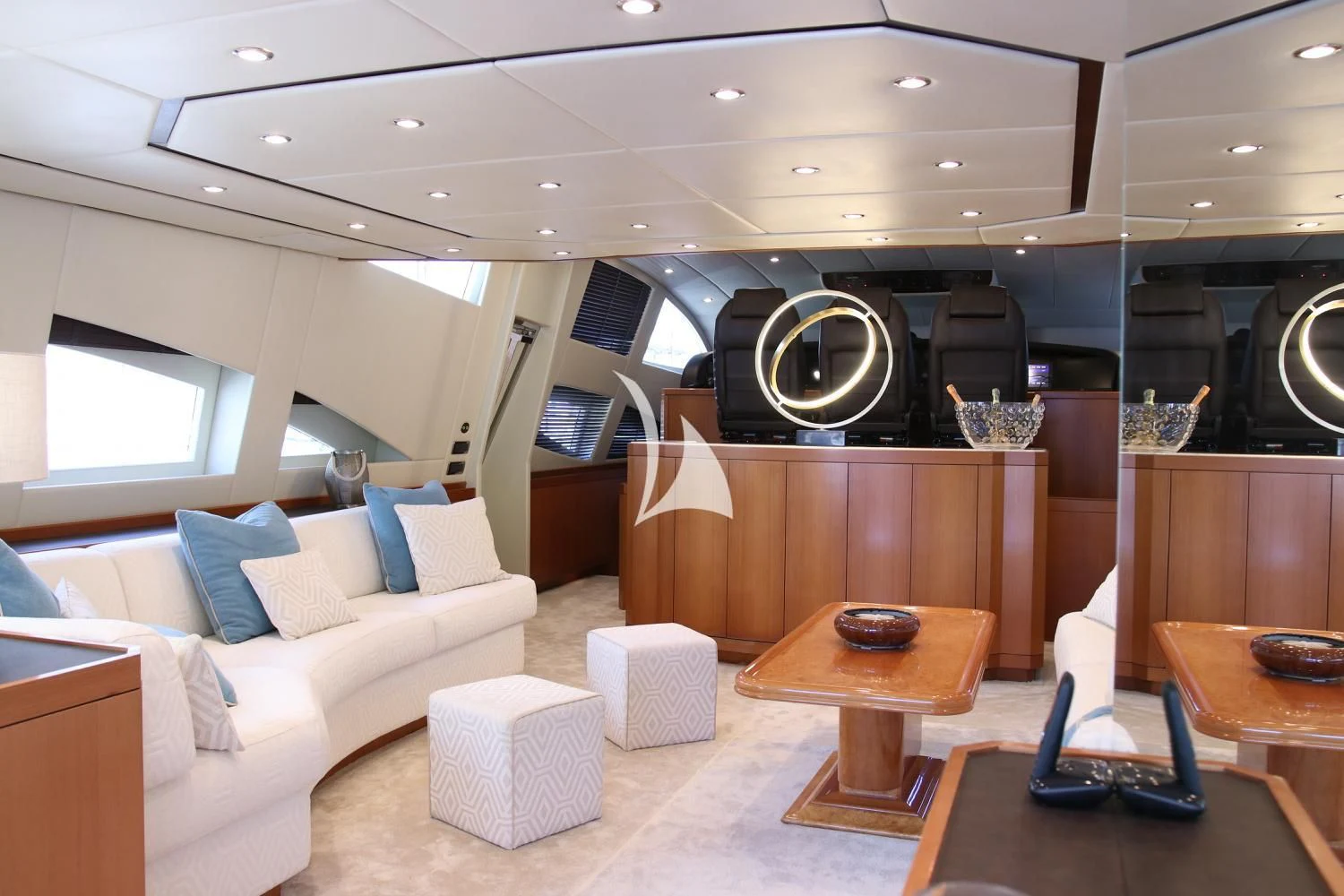 a living room with a large mirror aboard RAMSES II Yacht for Sale