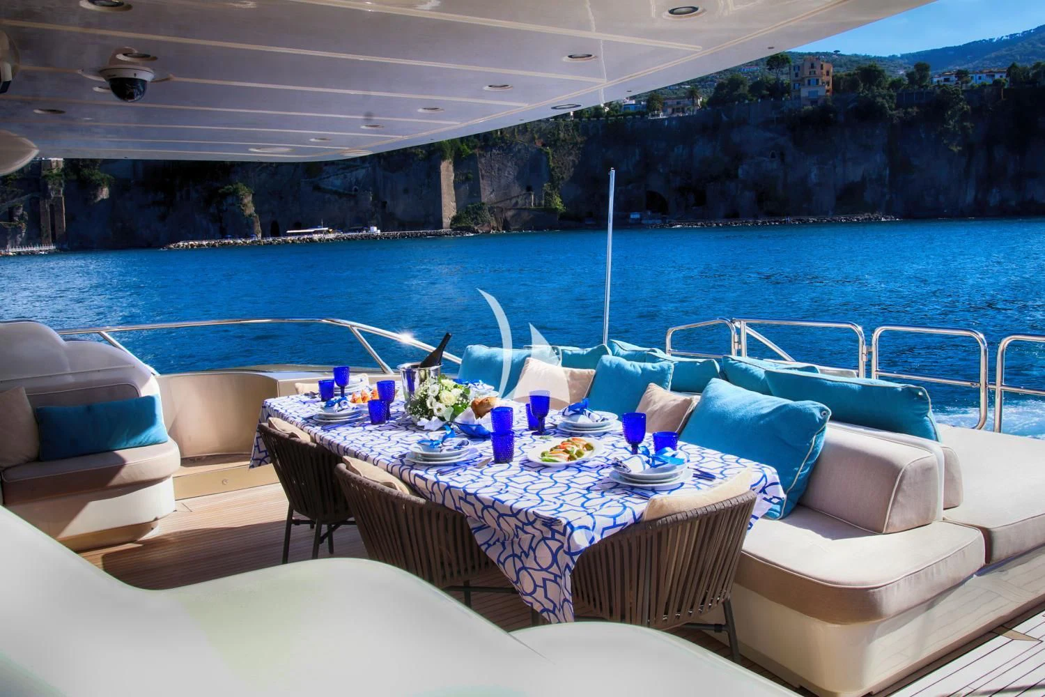 a table set for a meal on a boat aboard RAMSES II Yacht for Sale