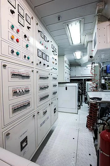 a room with white cabinets and white cabinets aboard RAMSES II Yacht for Sale