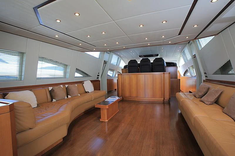 a living room with a wood floor aboard RAMSES II Yacht for Sale