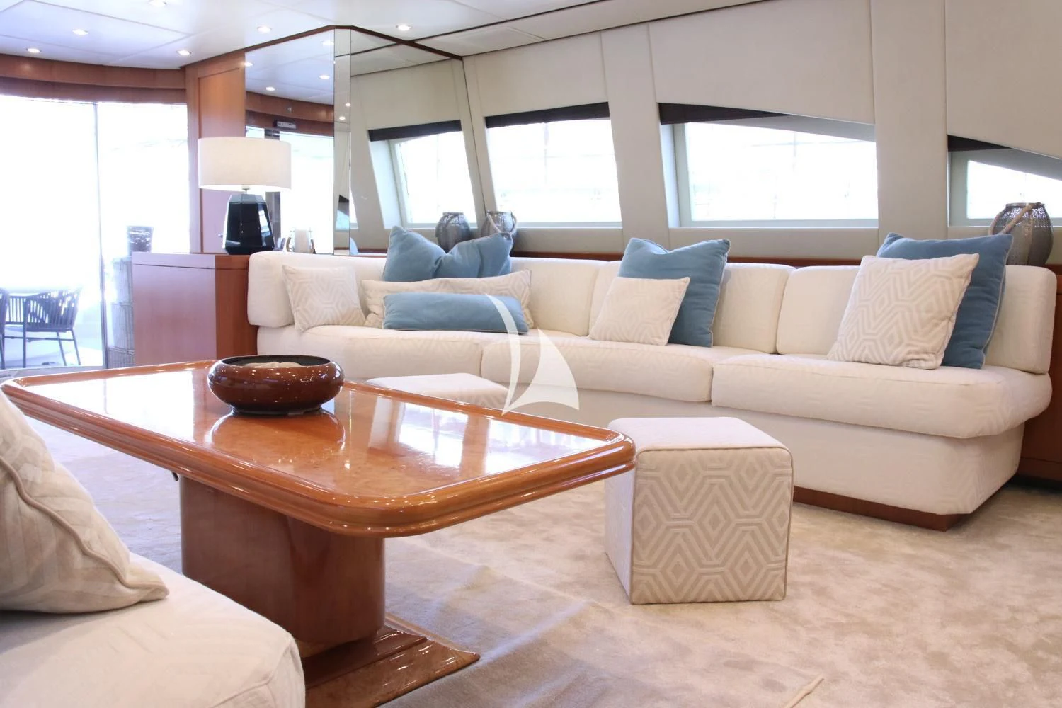 a living room with a couch and a table aboard RAMSES II Yacht for Sale