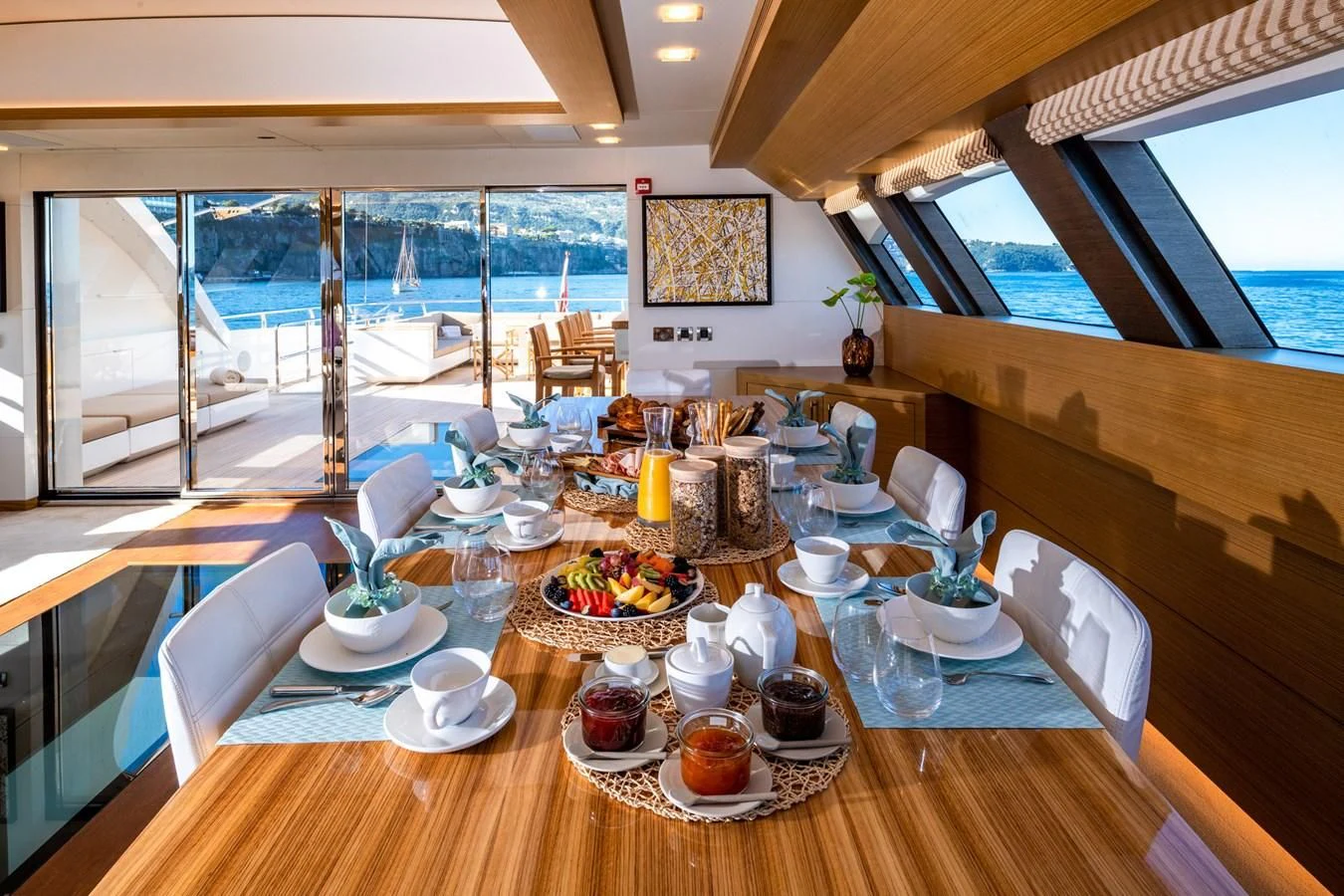 a table with food on it aboard QHT Yacht for Sale