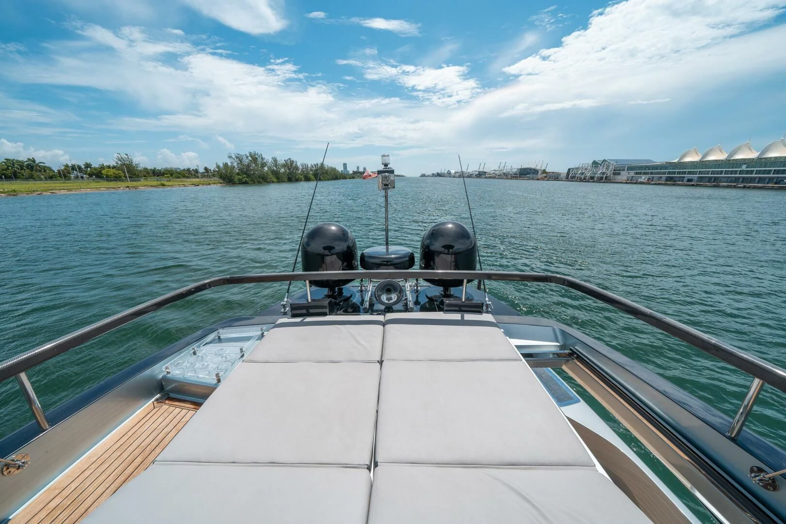 a boat with a steering wheel and a helmet on it aboard RECREATIONAL USE Yacht for Sale