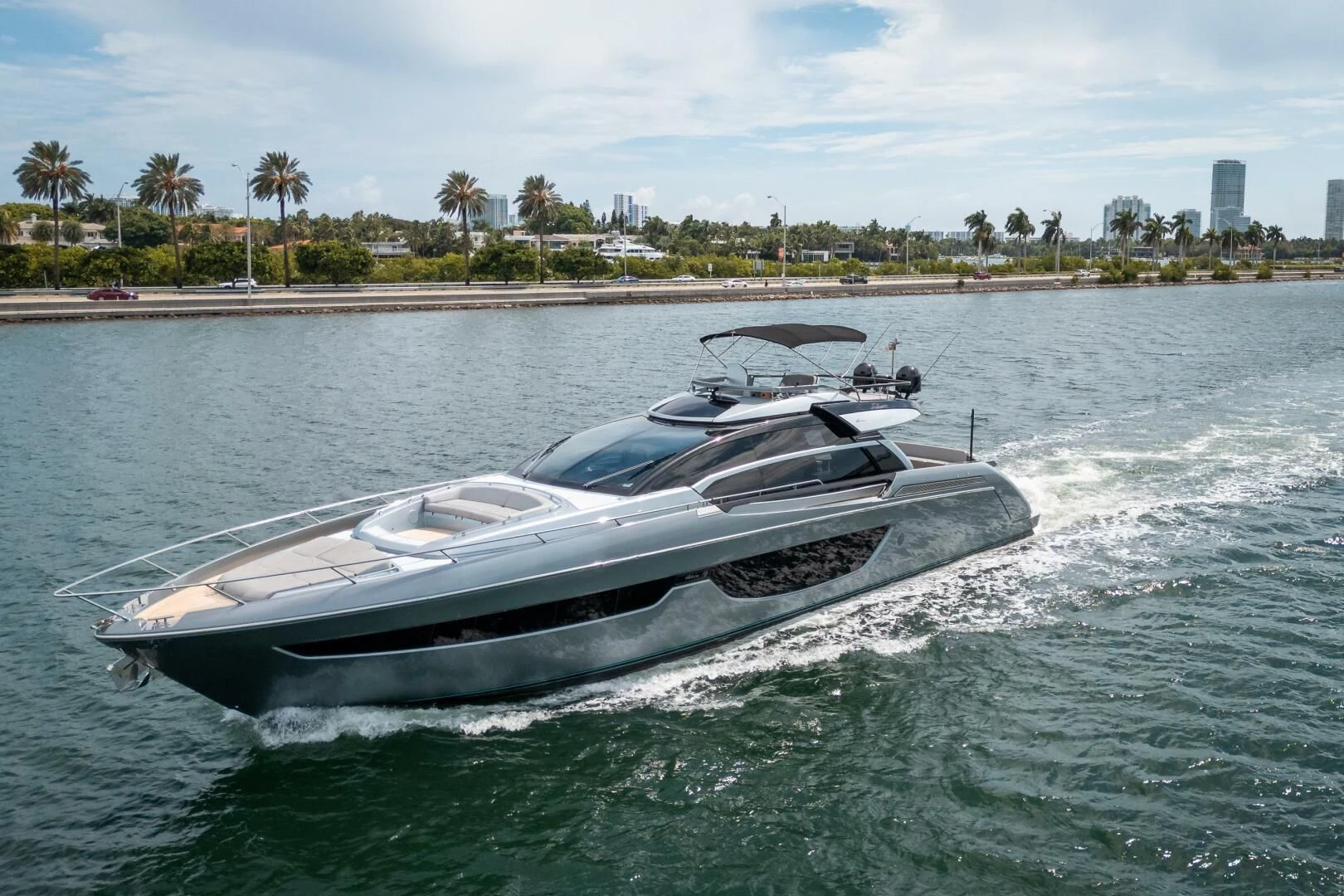 a white car driving on water aboard RECREATIONAL USE Yacht for Sale