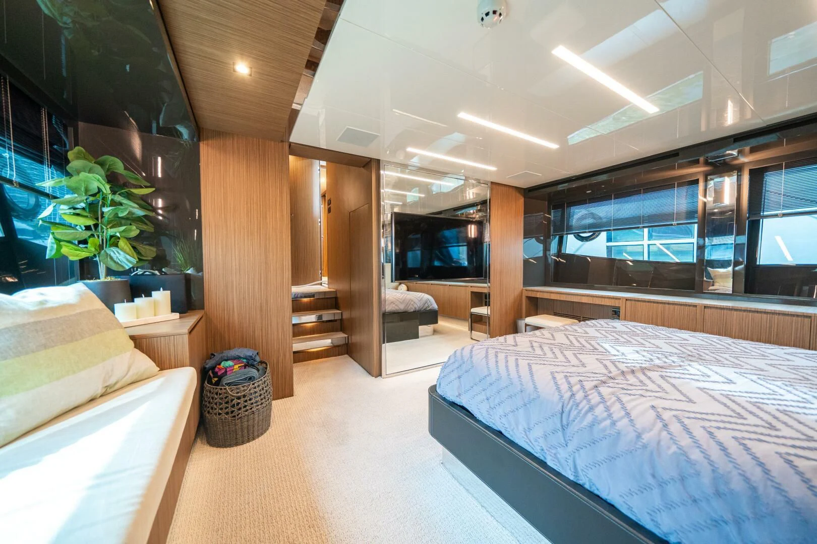 a room with a bed and a table aboard RECREATIONAL USE Yacht for Sale
