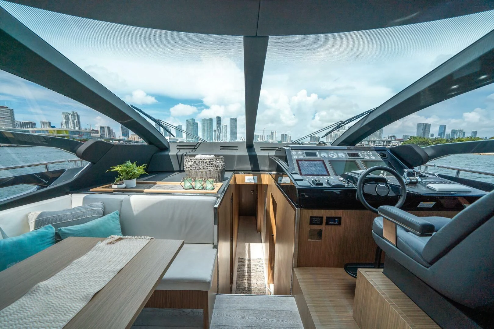 a room with a view of a city and a large body of water aboard RECREATIONAL USE Yacht for Sale