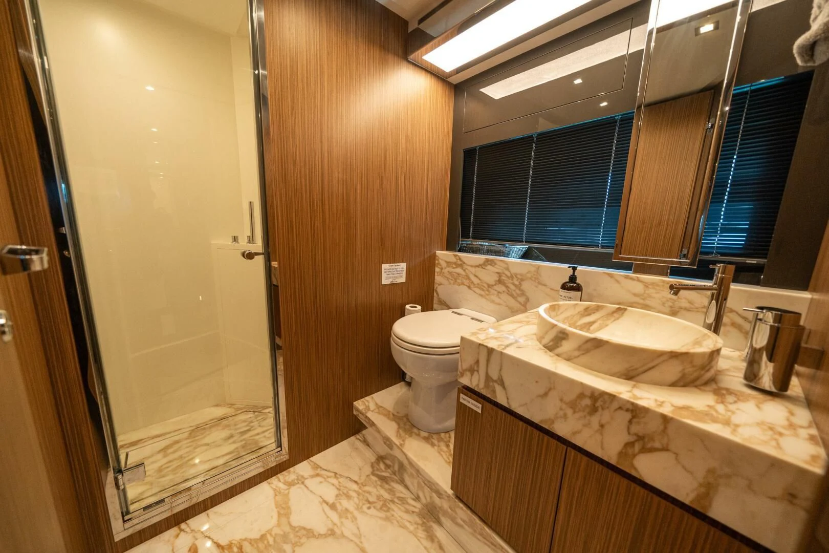 a bathroom with a large countertop aboard RECREATIONAL USE Yacht for Sale