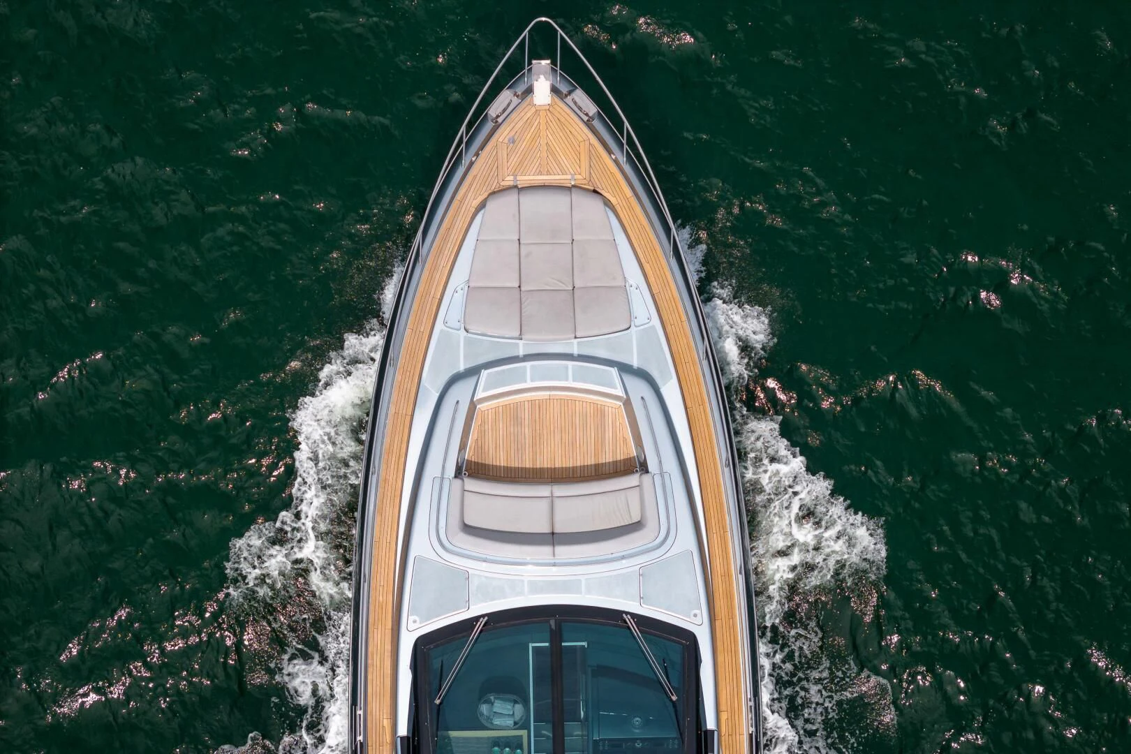 a white and yellow boat on water aboard RECREATIONAL USE Yacht for Sale