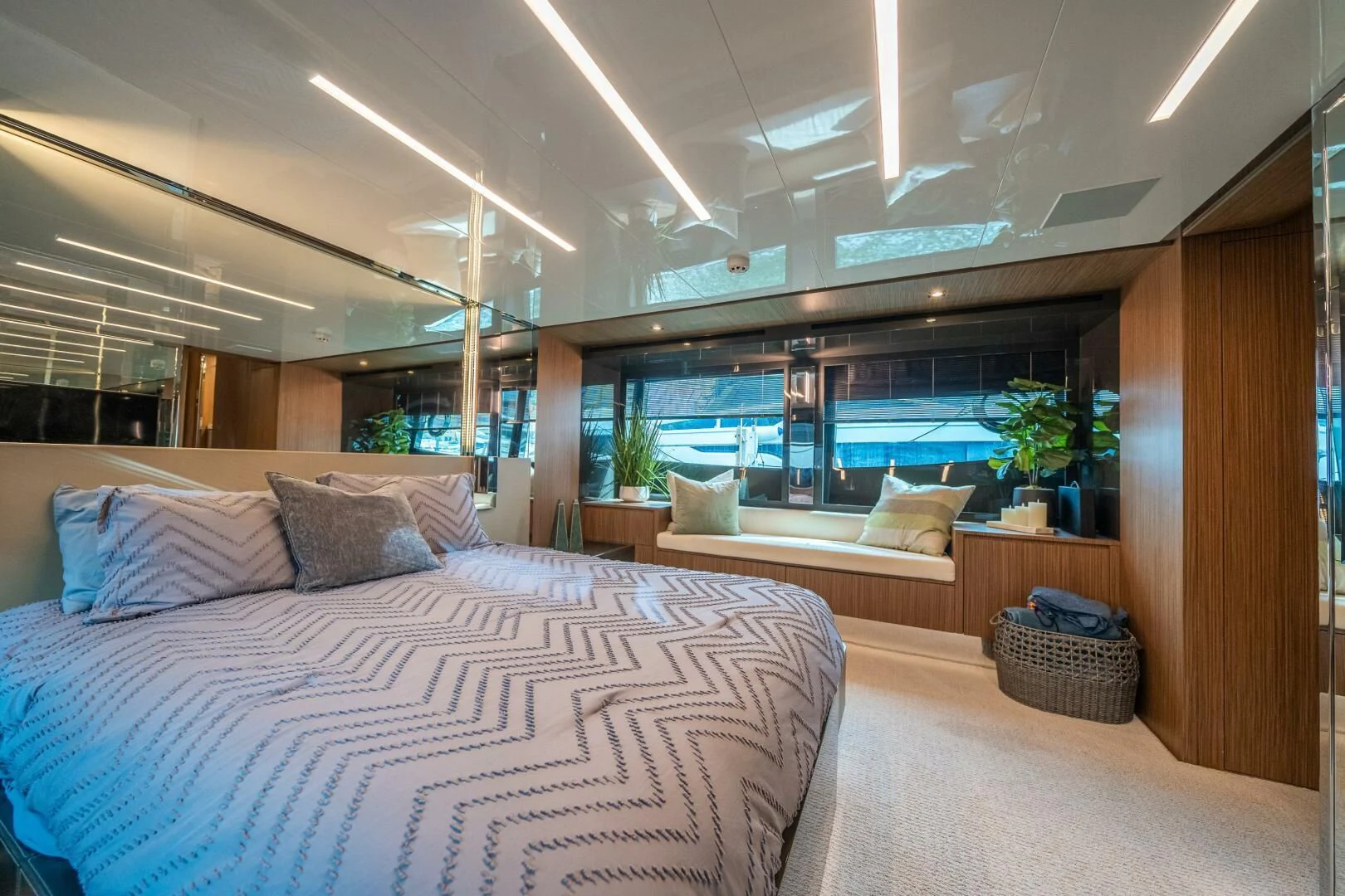 a room with a bed and a desk aboard RECREATIONAL USE Yacht for Sale