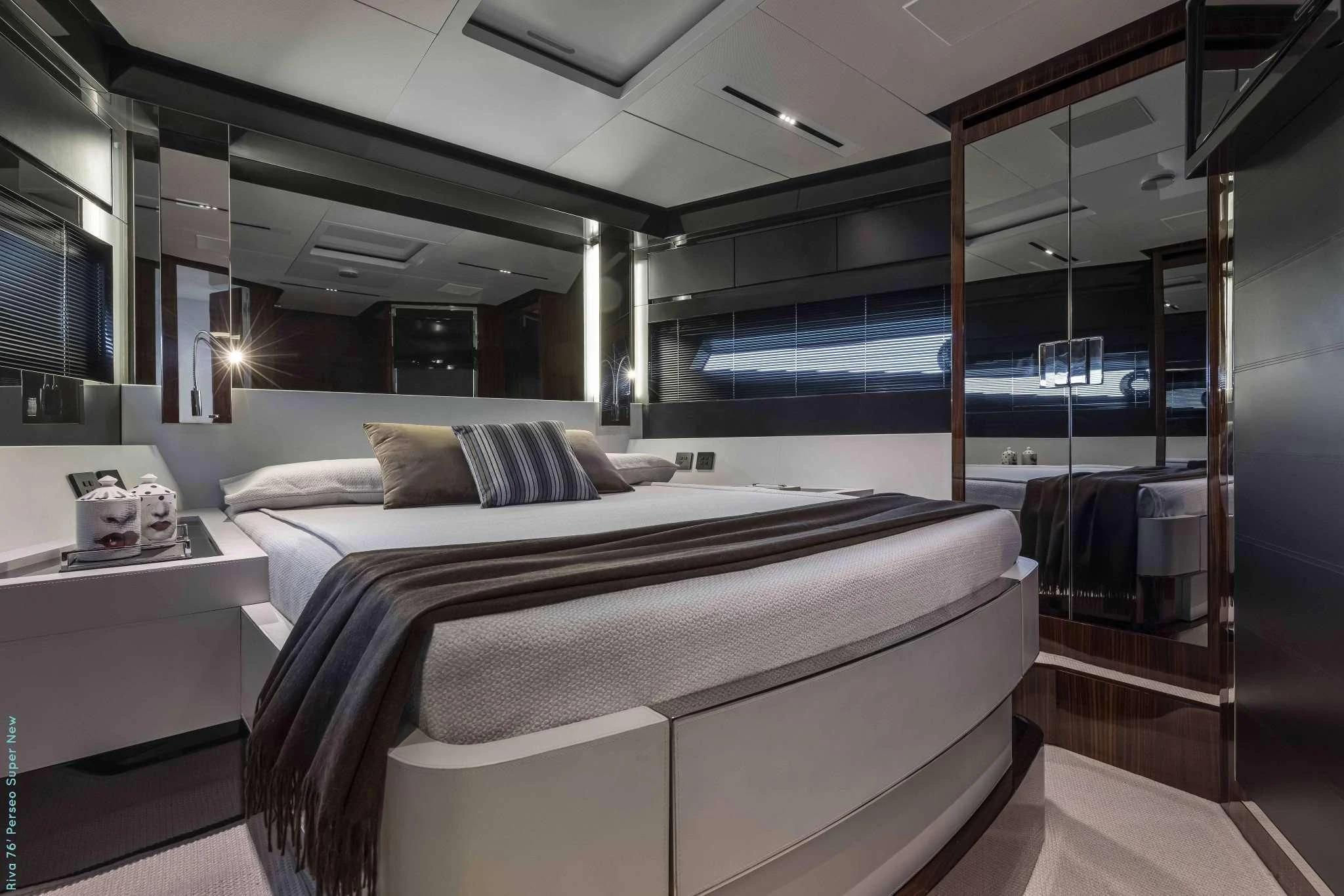 a room with a bed and a desk aboard RECREATIONAL USE Yacht for Sale