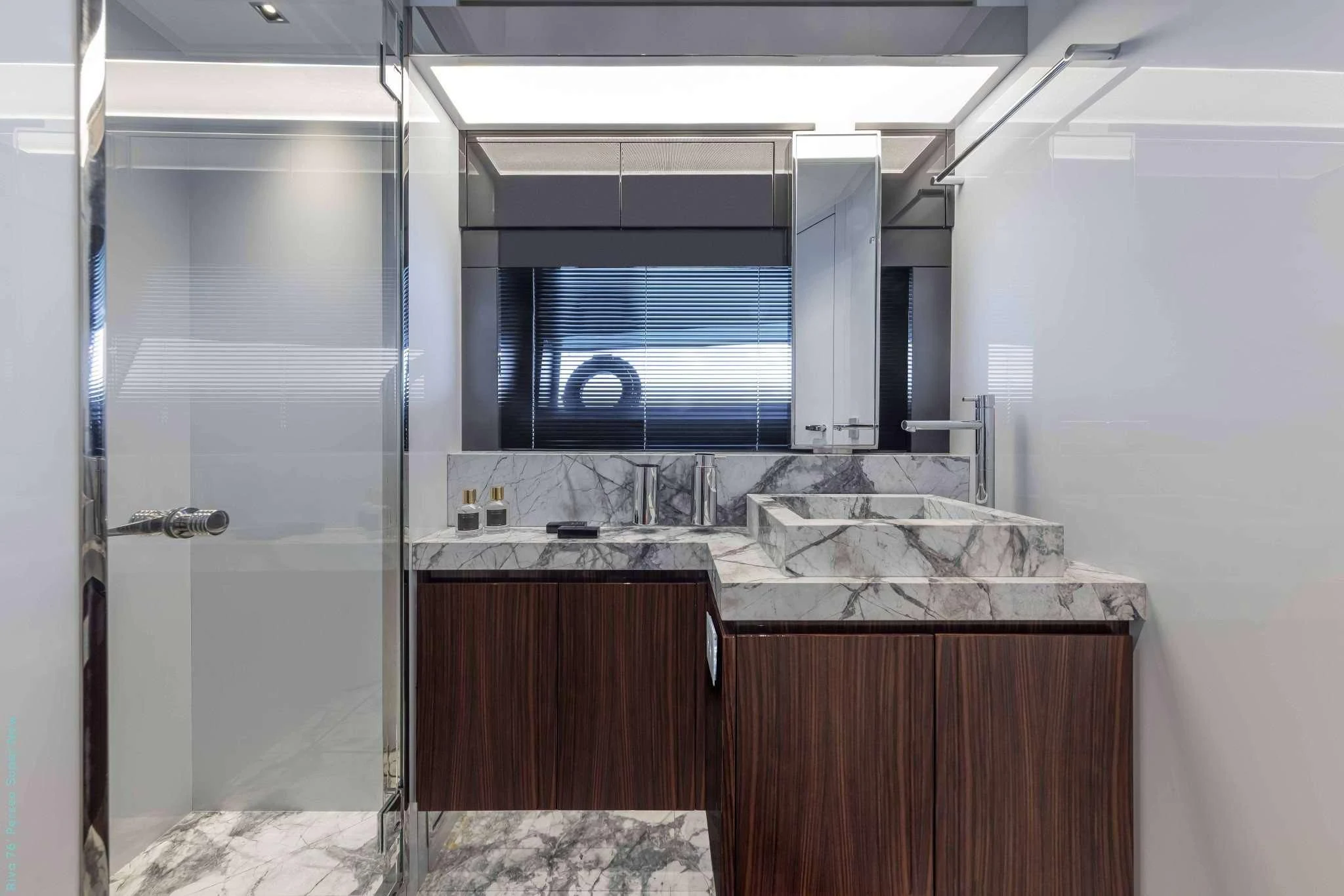 a kitchen with a glass door aboard RECREATIONAL USE Yacht for Sale