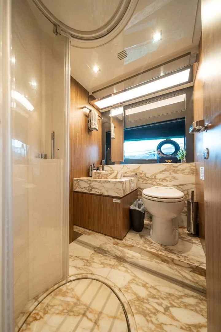 a bathroom with a large window aboard RECREATIONAL USE Yacht for Sale