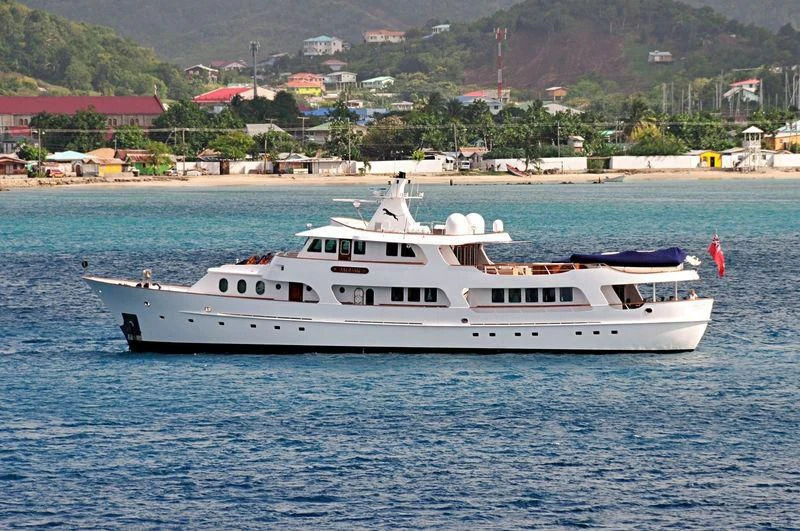 a white boat in the water aboard SEA LION Yacht for Sale