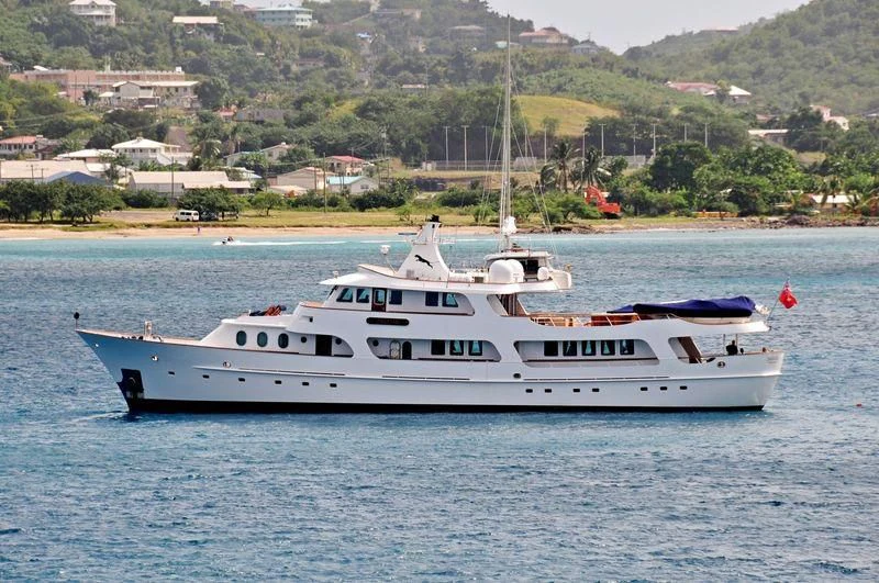 a white boat on the water aboard SEA LION Yacht for Sale