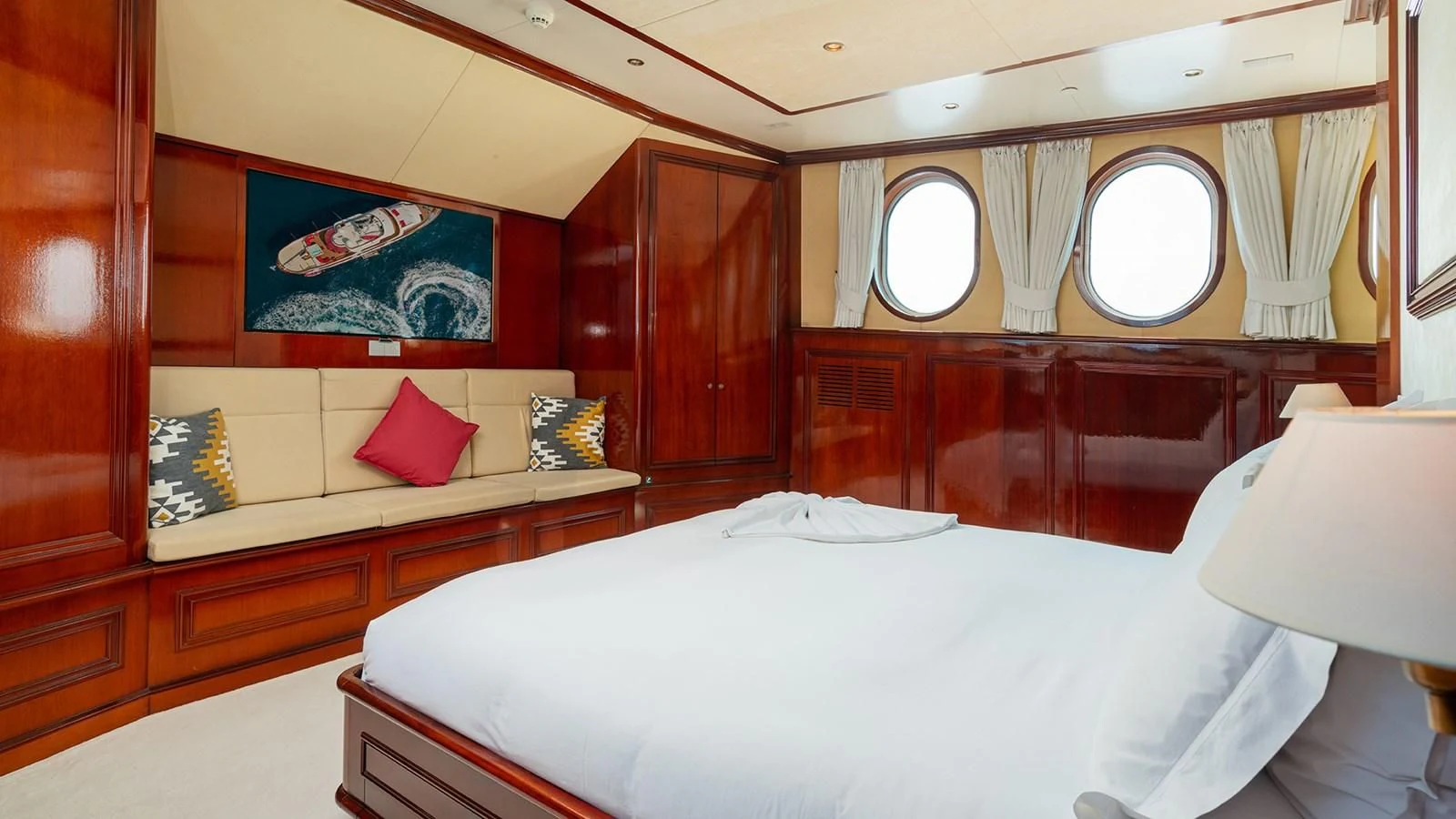 a room with a bed and a window aboard SEA LION Yacht for Sale
