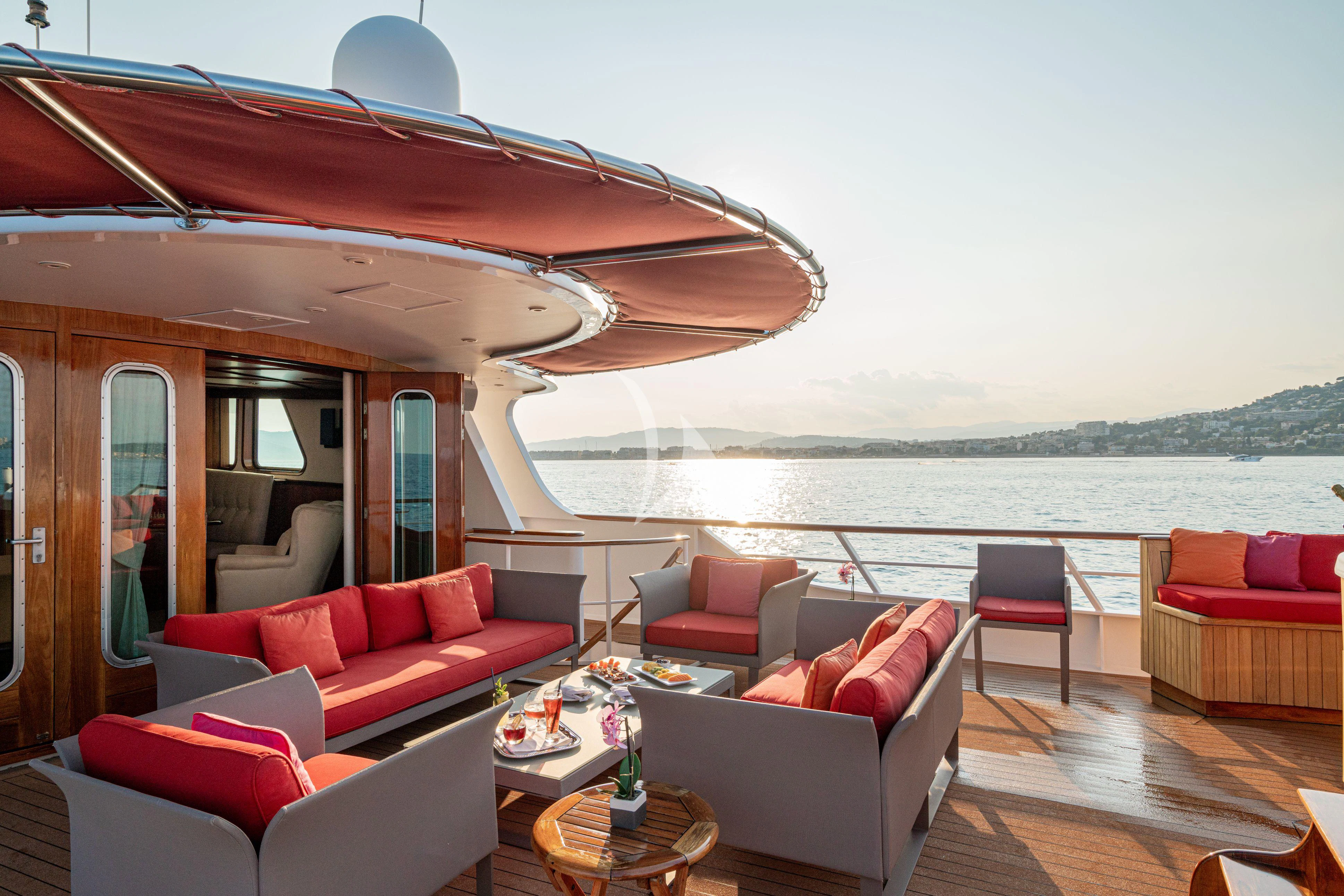 a living room with a large body of water aboard SEA LION Yacht for Sale