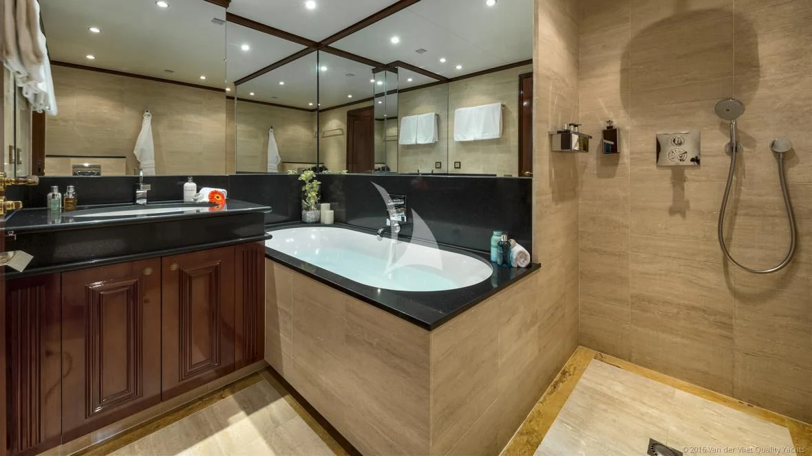 a bathroom with a sink and a mirror aboard SEA LION Yacht for Sale