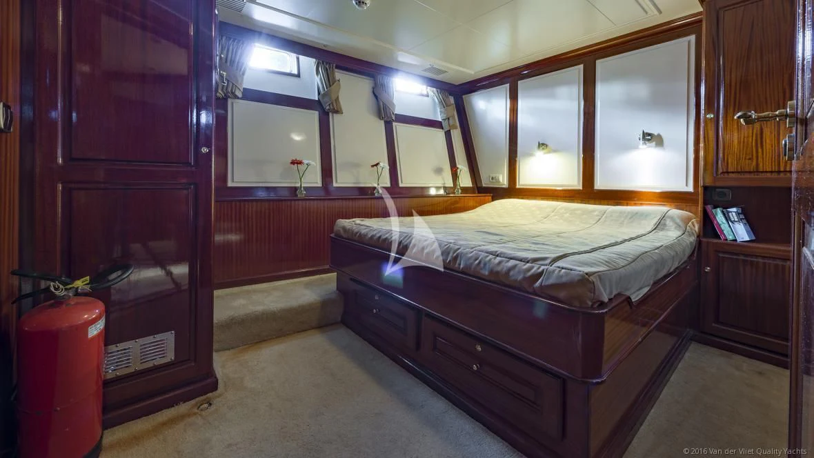 a bed in a room aboard SEA LION Yacht for Sale