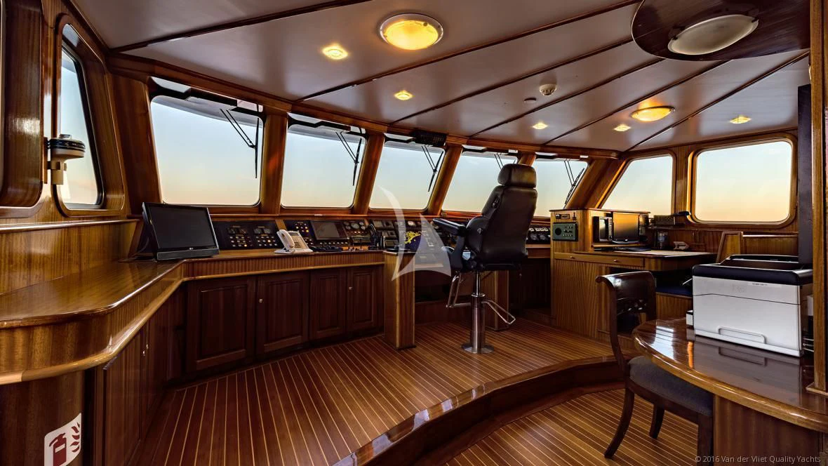 inside of a vehicle with a desk and computer aboard SEA LION Yacht for Sale