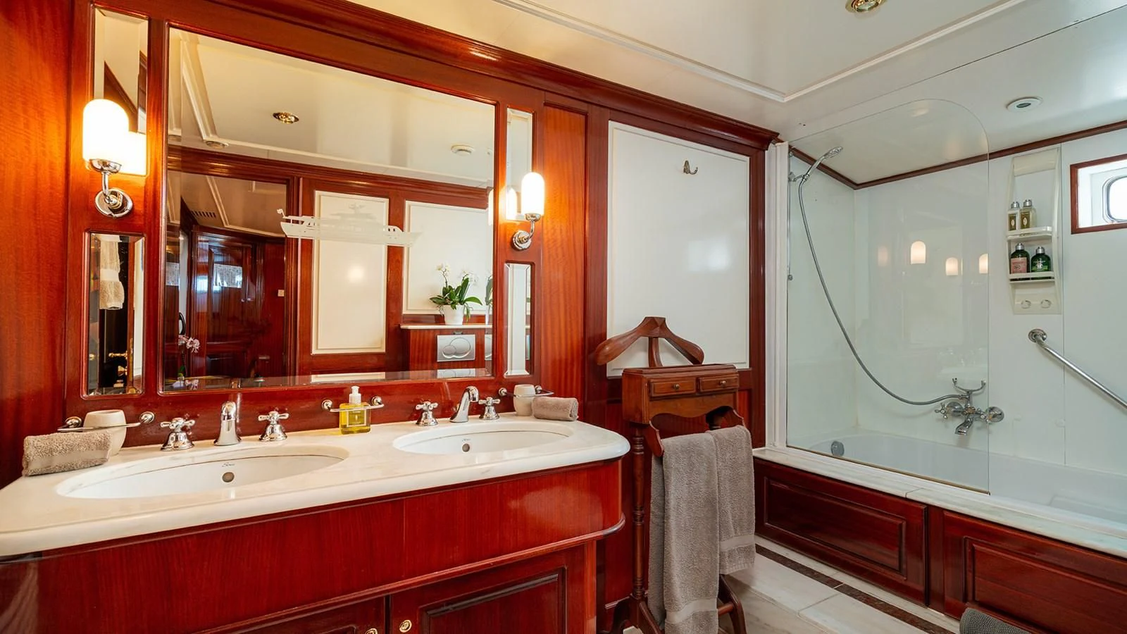 a bathroom with a large mirror aboard SEA LION Yacht for Sale