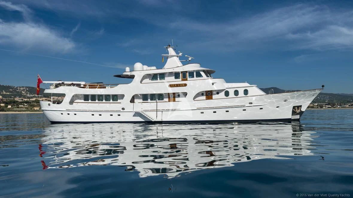 a white yacht in the water aboard SEA LION Yacht for Sale