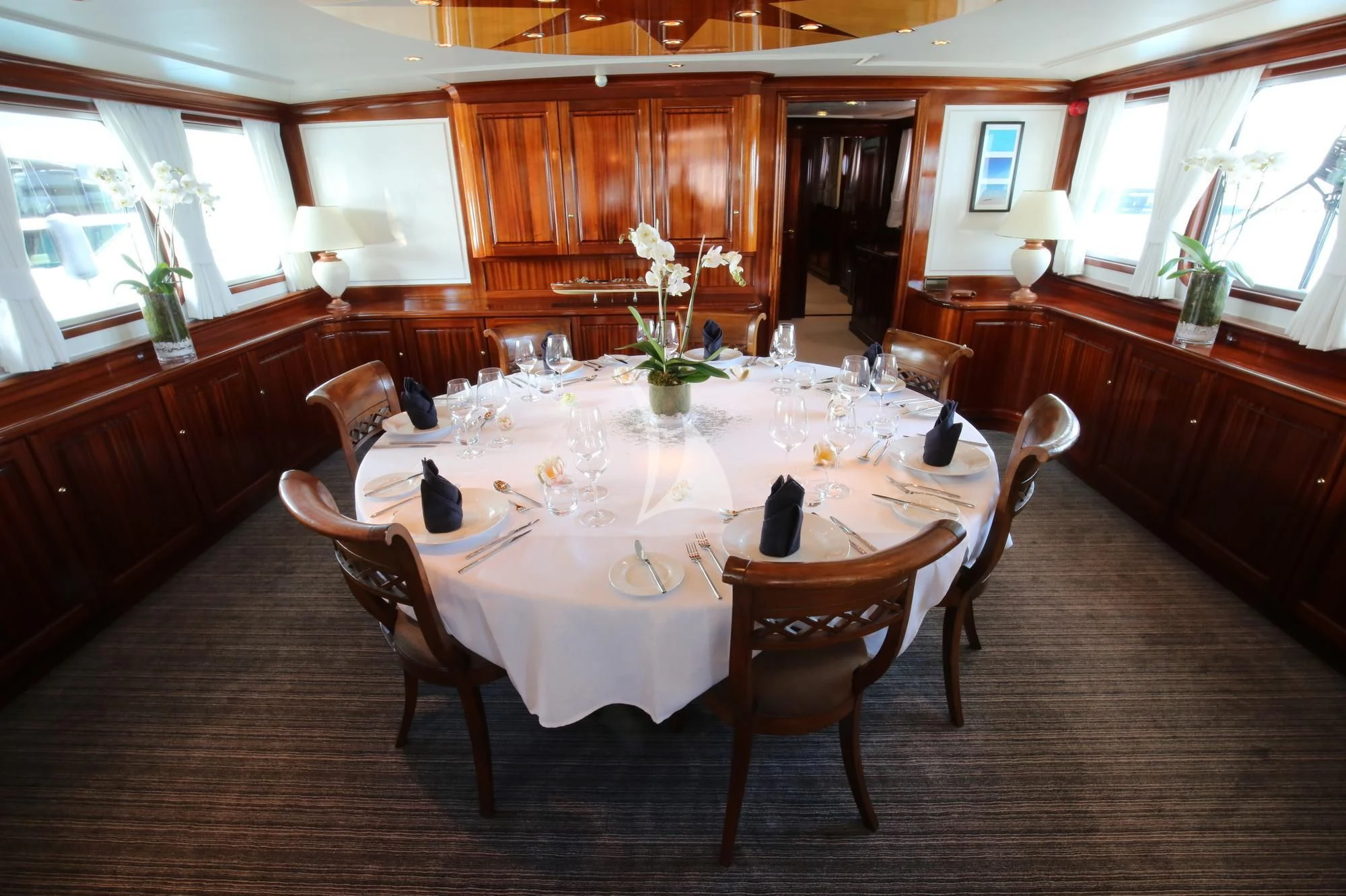 a dining room with a table aboard SEA LION Yacht for Sale