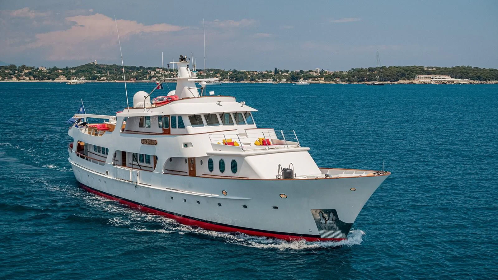a large white boat in the water aboard SEA LION Yacht for Sale