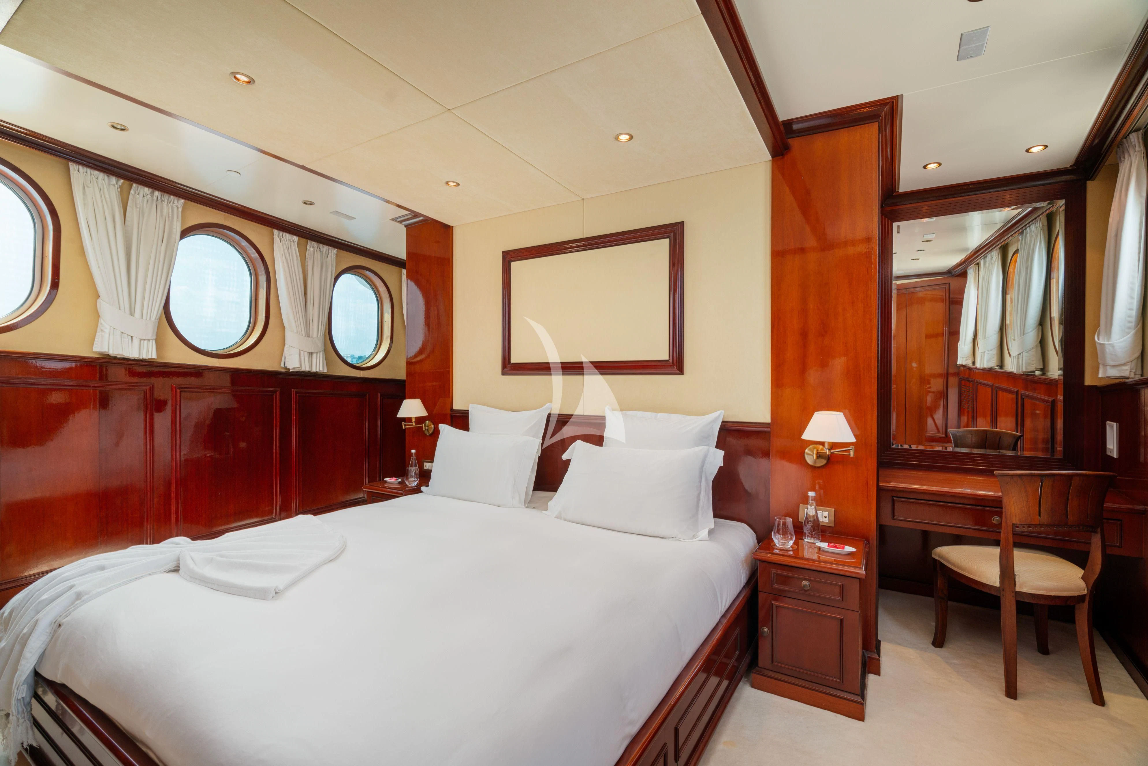 a large bed in a room aboard SEA LION Yacht for Sale