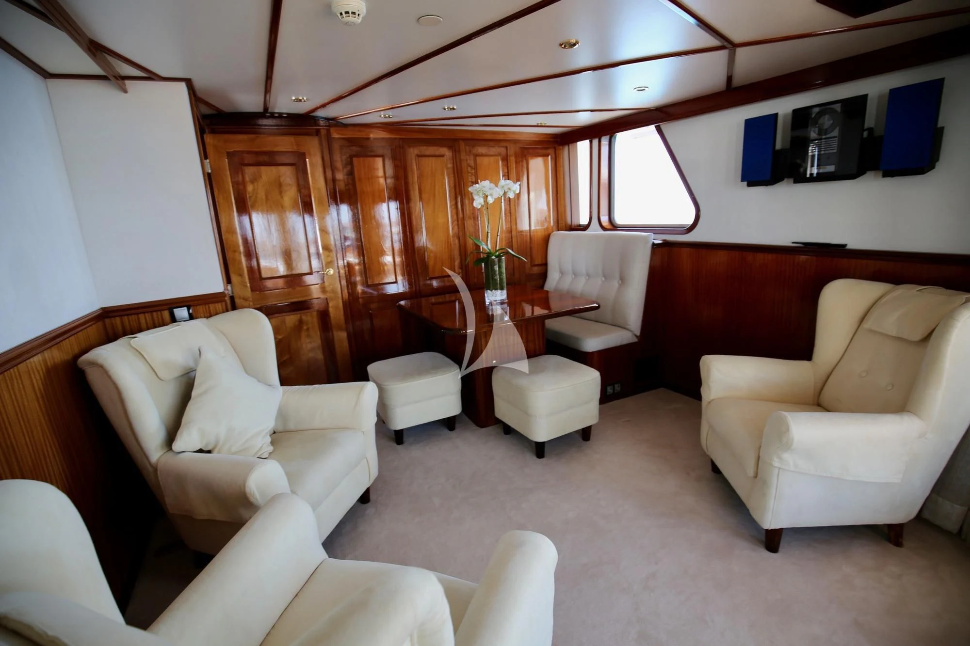 a room with a table chairs and a couch aboard SEA LION Yacht for Sale