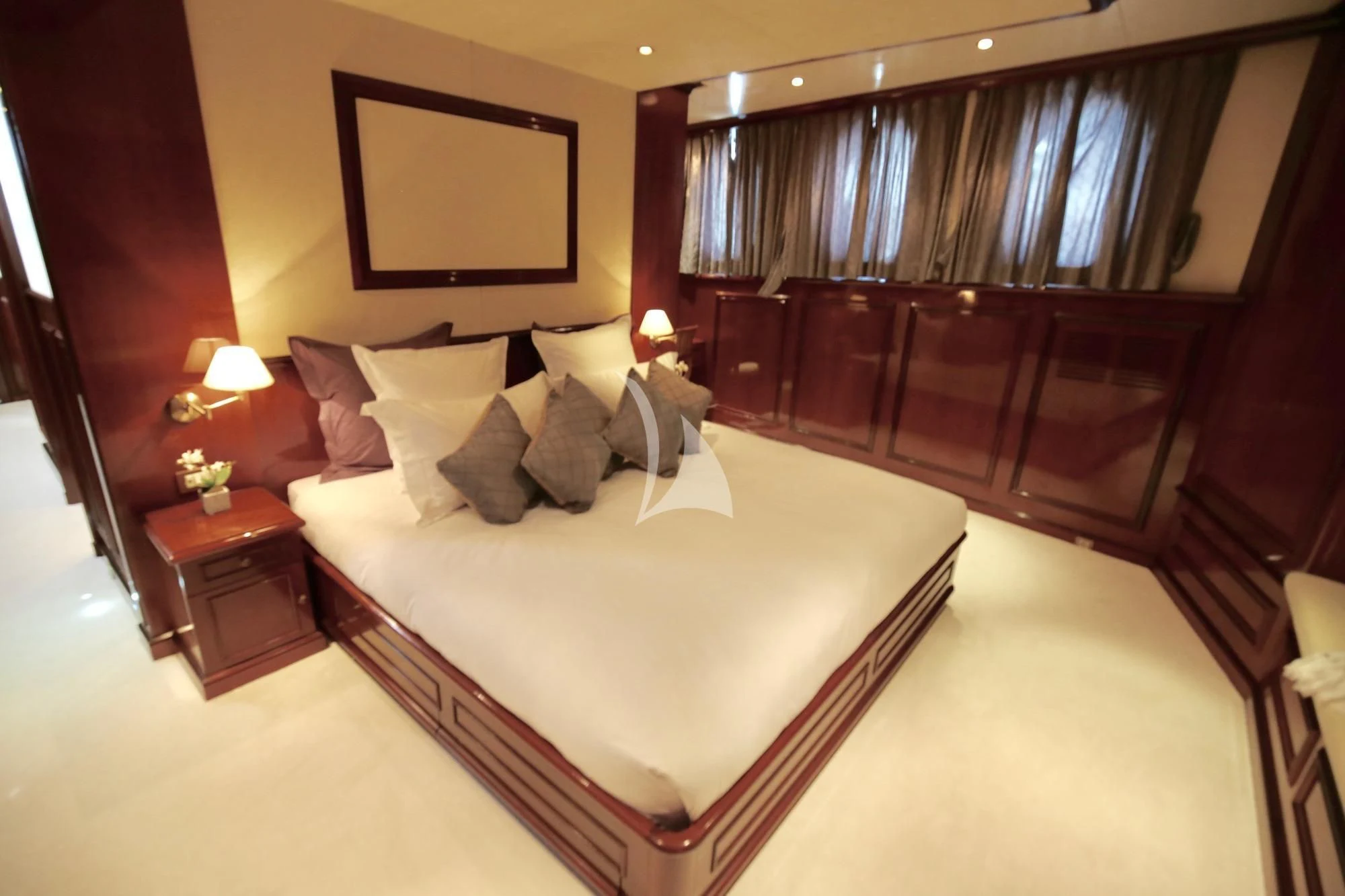 a hotel room with a bed and a large window aboard SEA LION Yacht for Sale