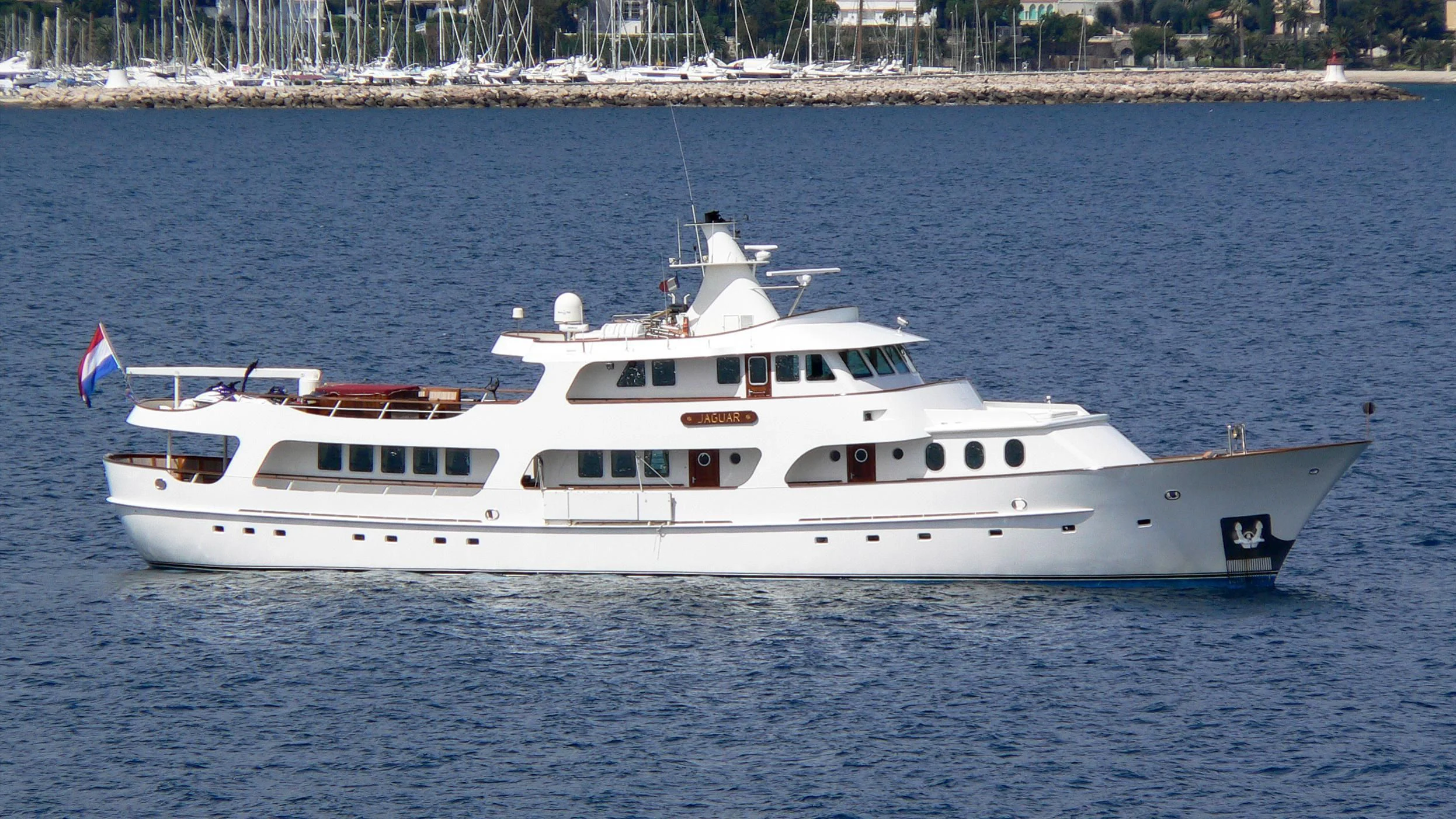 a white yacht on the water aboard SEA LION Yacht for Sale