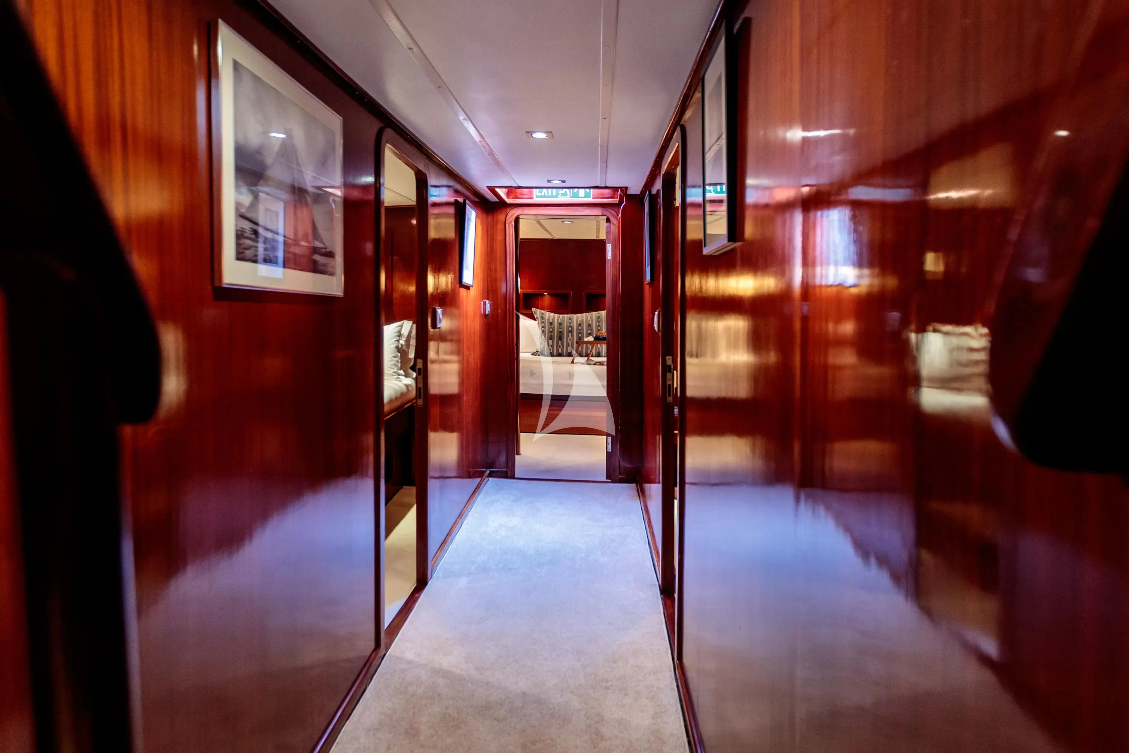a hallway with red lights aboard VITA DOLCE Yacht for Sale