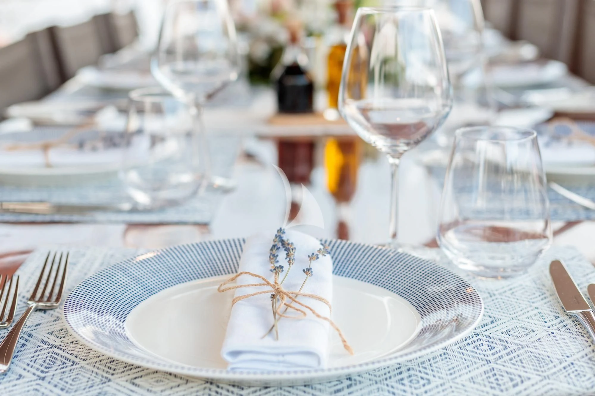 a plate with a fork and knife on it aboard VITA DOLCE Yacht for Sale
