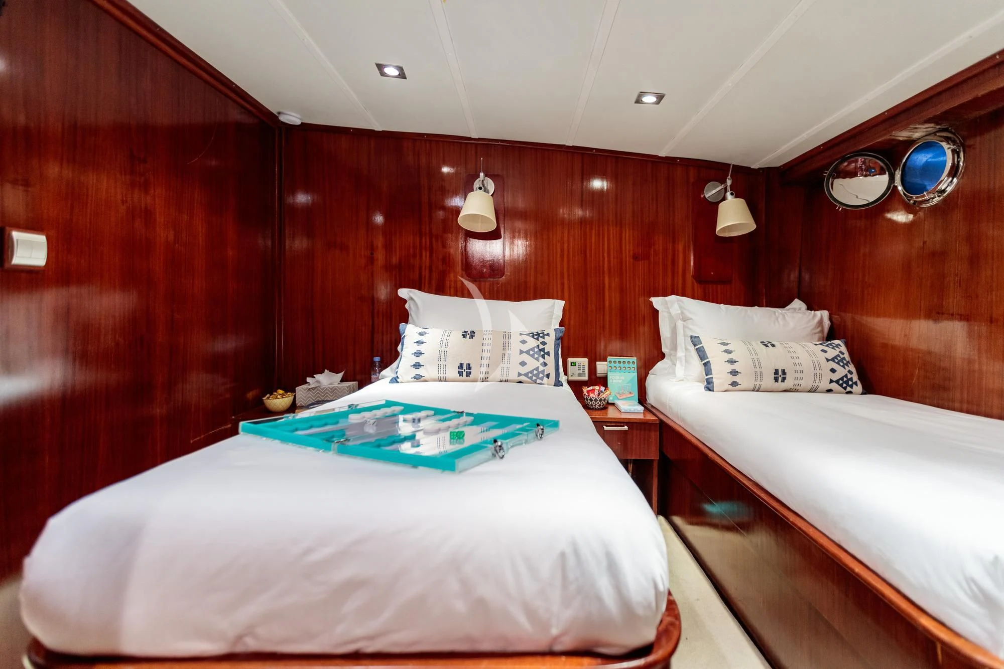 a couple of beds in a room aboard VITA DOLCE Yacht for Sale