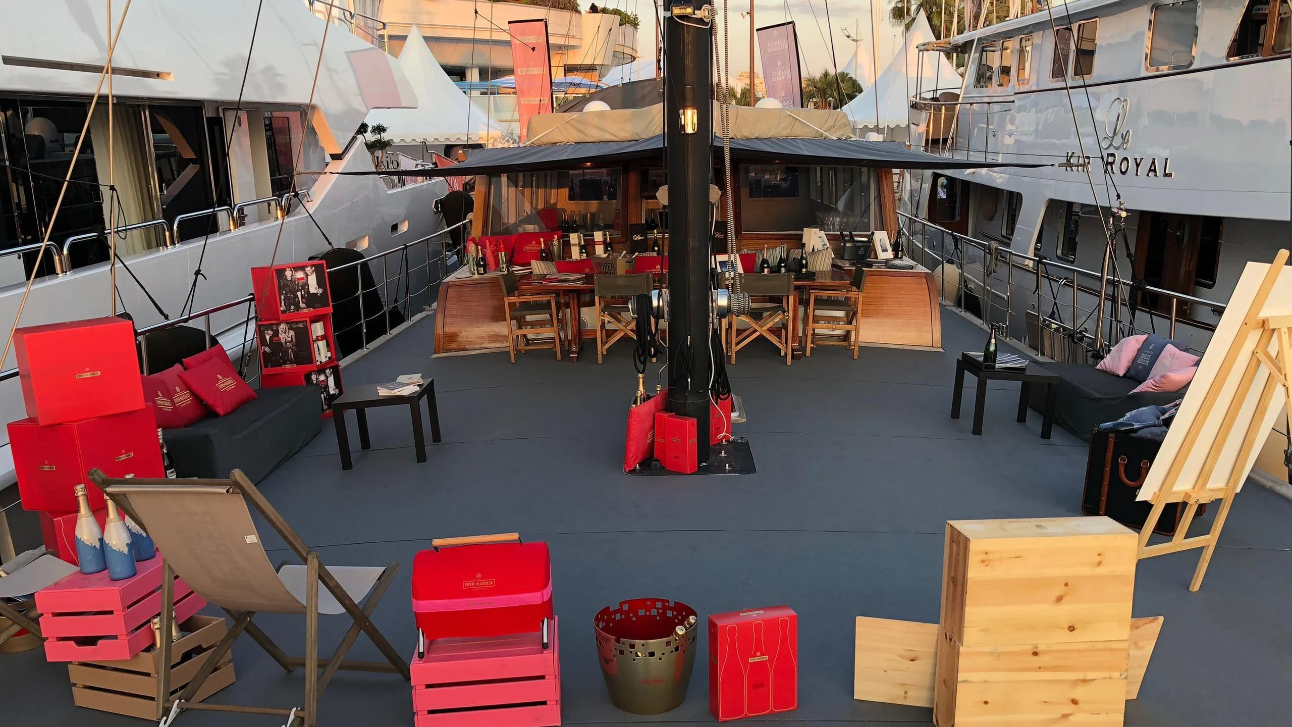 a room with tables and chairs aboard VITA DOLCE Yacht for Sale