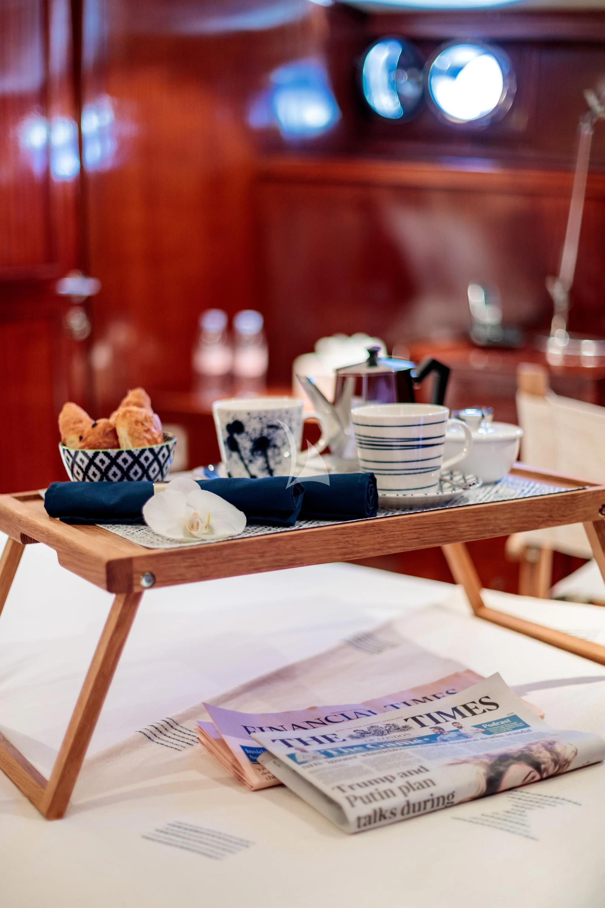 a table with a bowl of food and a plate of food aboard VITA DOLCE Yacht for Sale