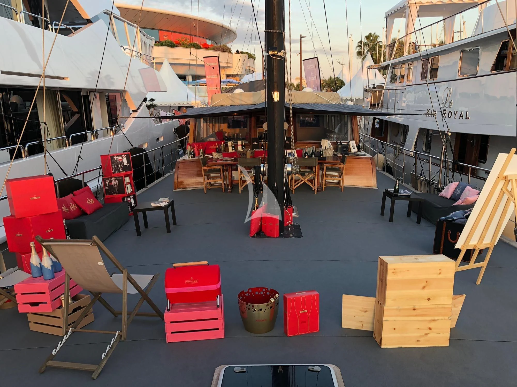 a group of tables and chairs outside aboard VITA DOLCE Yacht for Sale