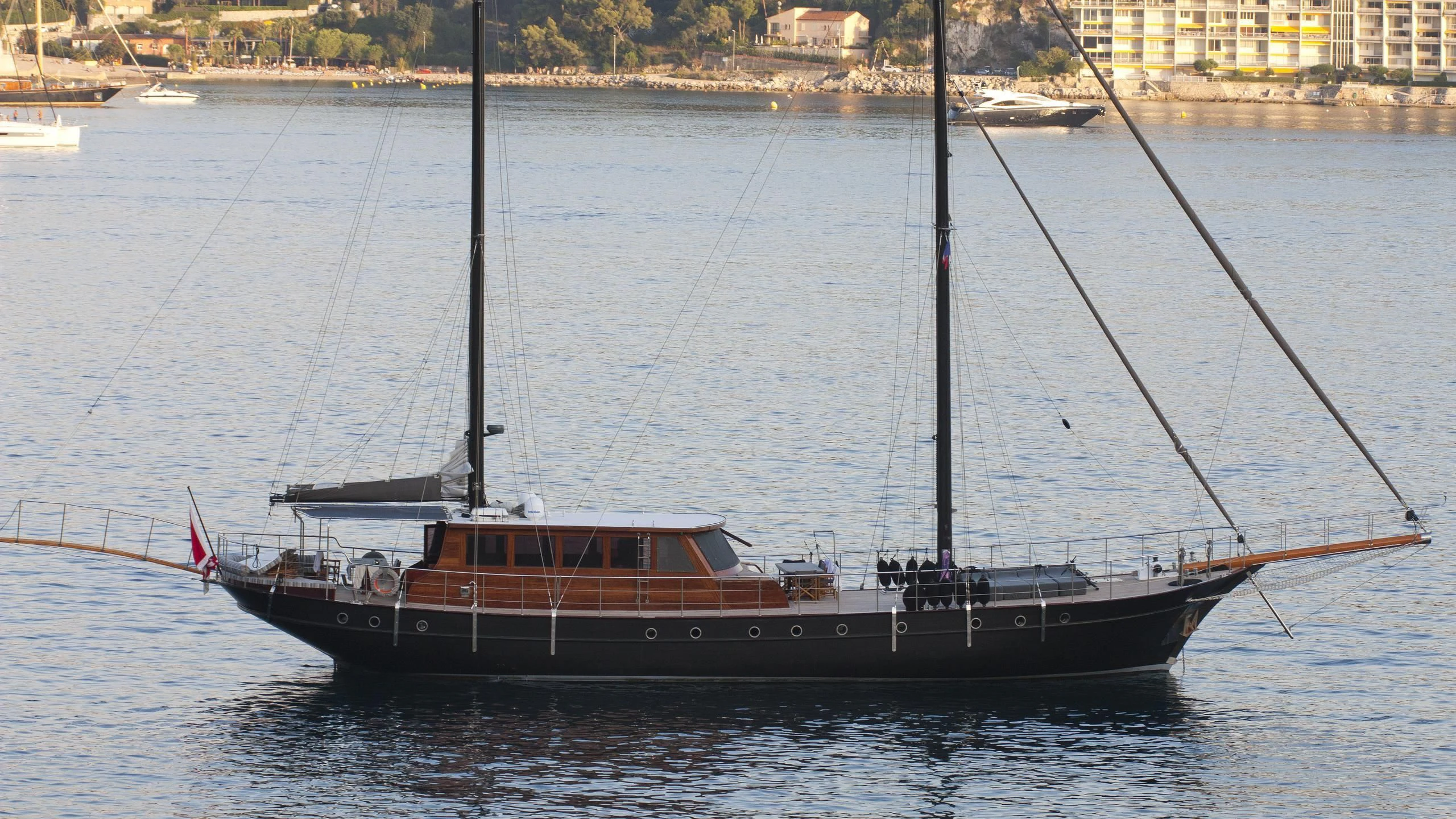 a large boat in the water aboard VITA DOLCE Yacht for Sale