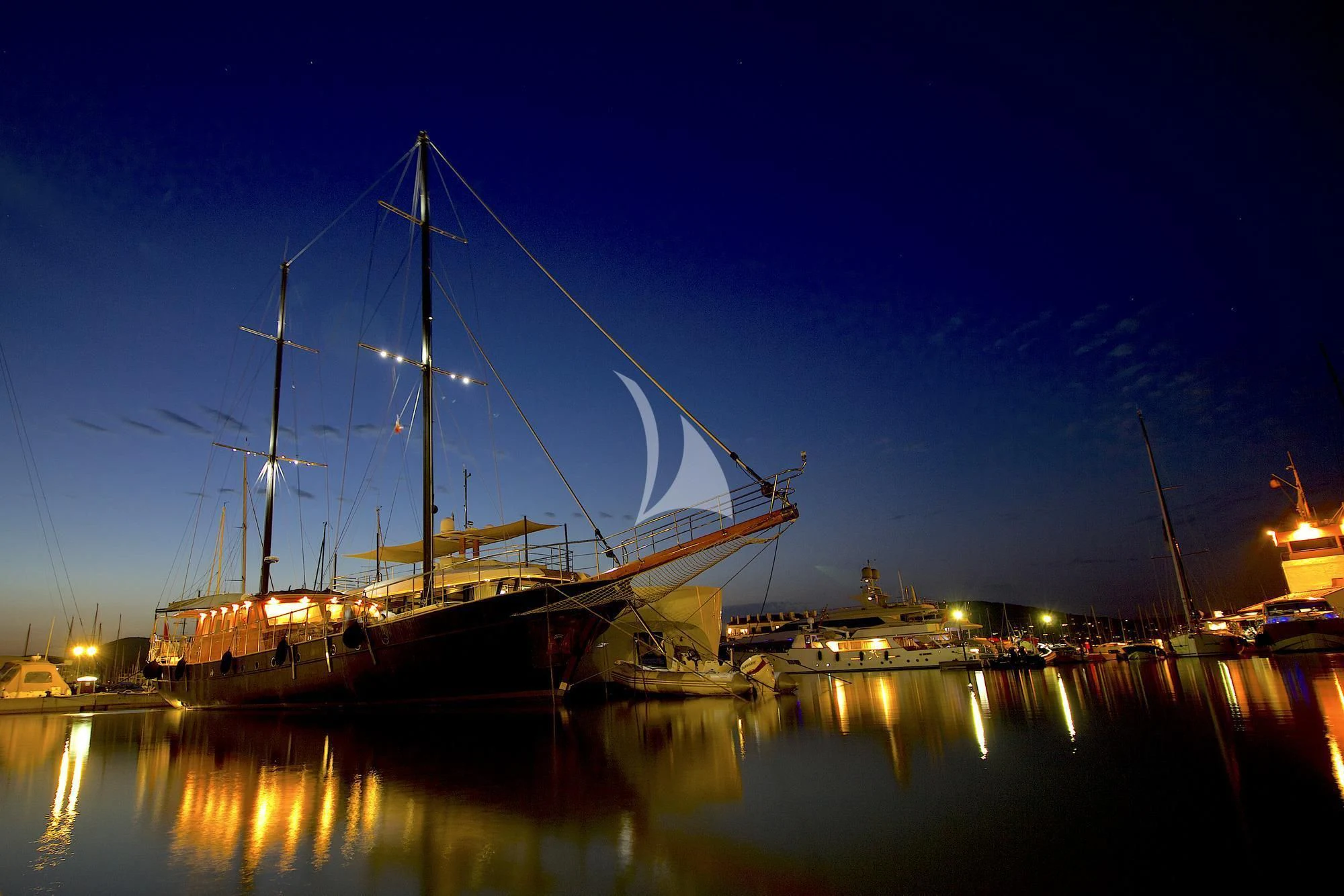 a large ship at night aboard VITA DOLCE Yacht for Sale