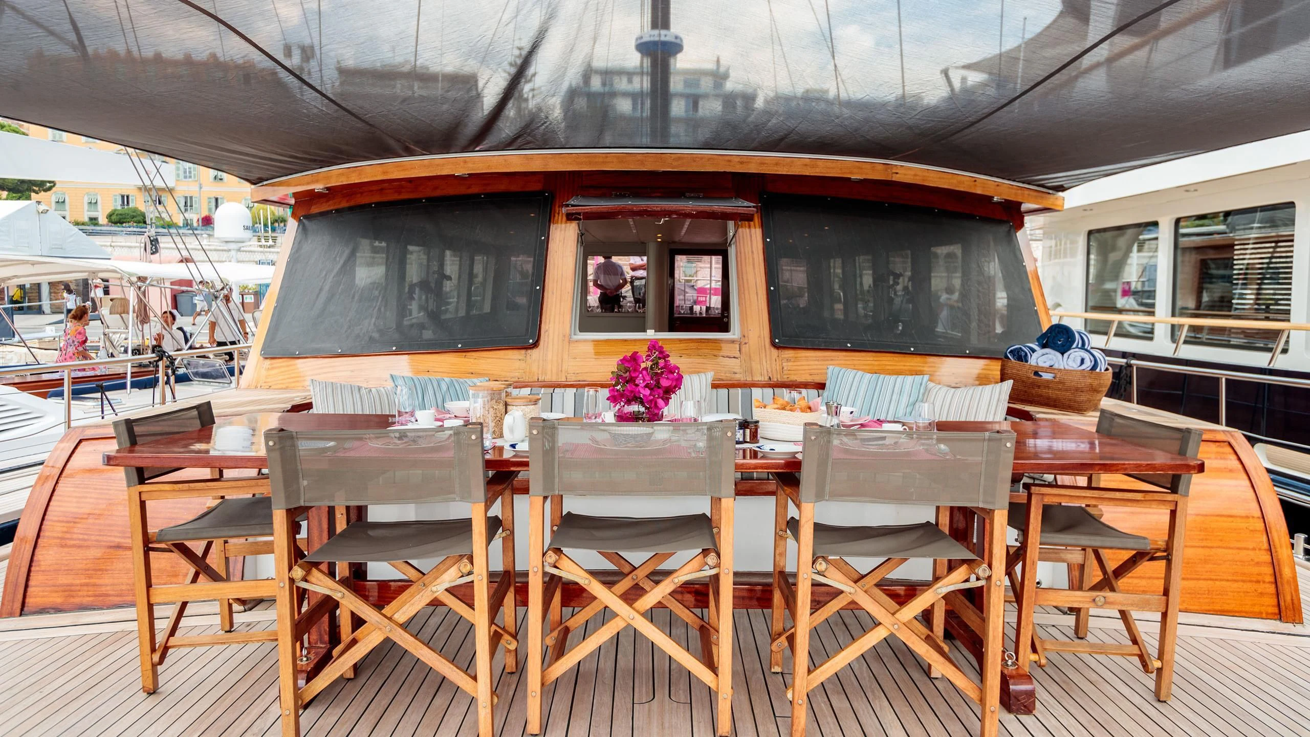 a table with chairs on it aboard VITA DOLCE Yacht for Sale