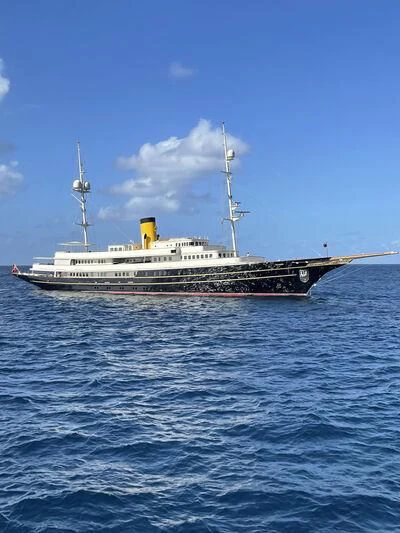 a large ship in the water aboard NERO Yacht for Sale
