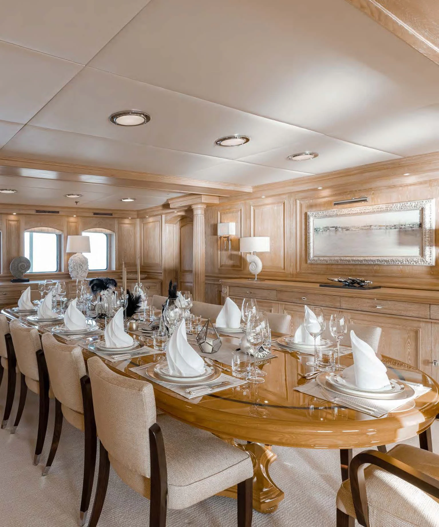 a large dining room table aboard NERO Yacht for Sale