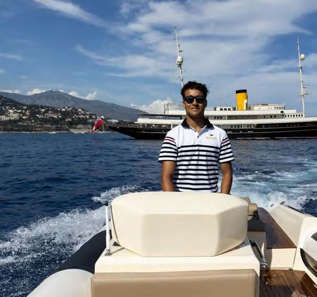 a person standing on a boat aboard NERO Yacht for Sale
