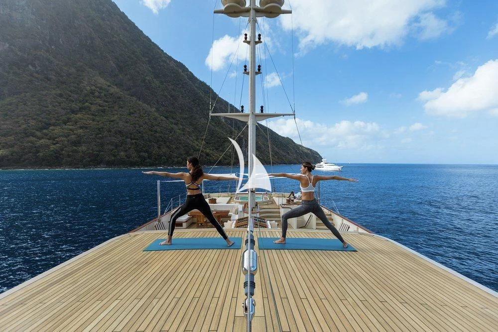 two people sitting on a boat aboard NERO Yacht for Sale