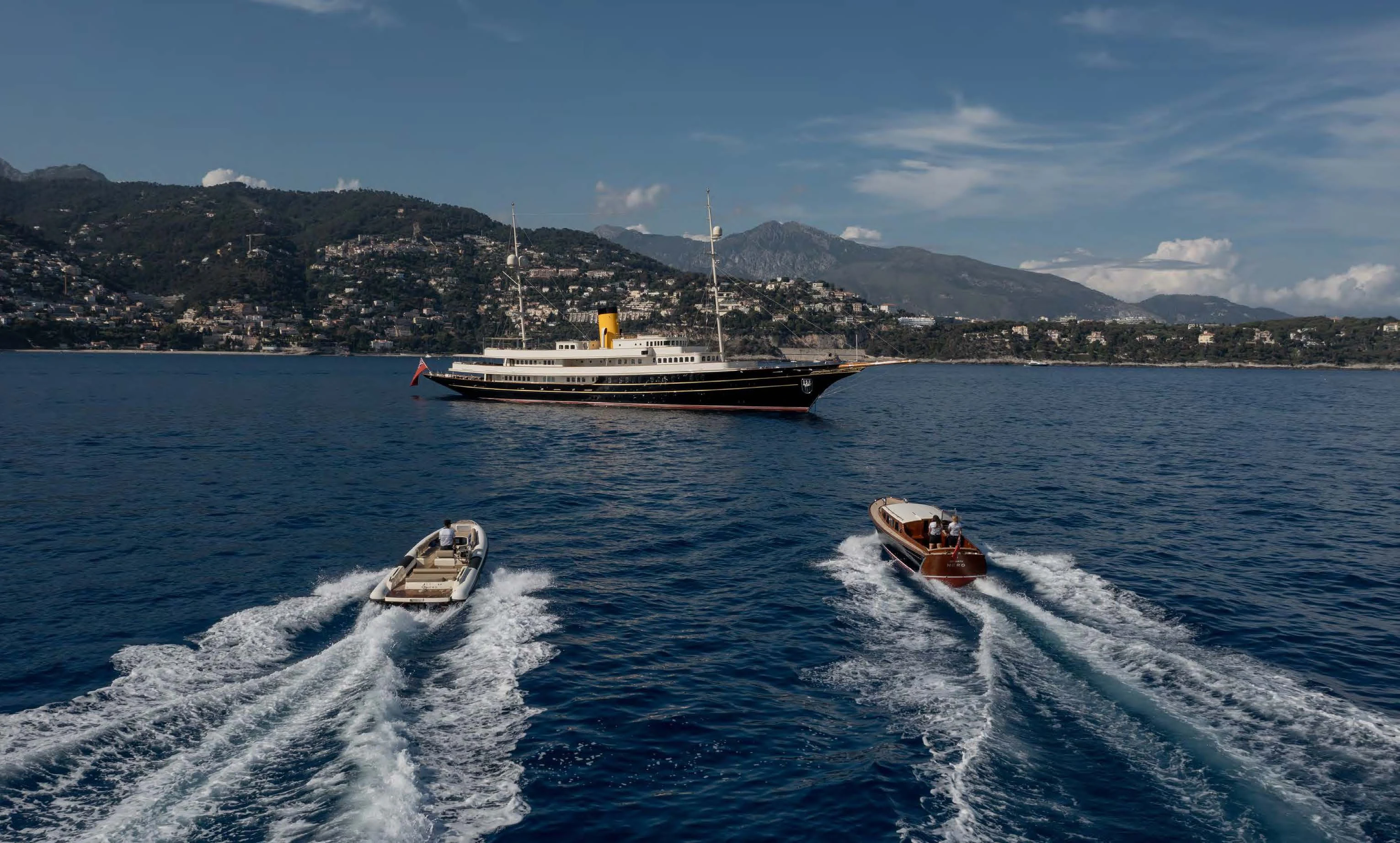 a boat and a boat on the water aboard NERO Yacht for Sale